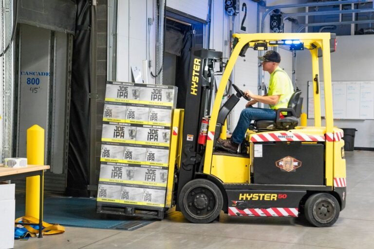 Forklift loading goods in a warehouse